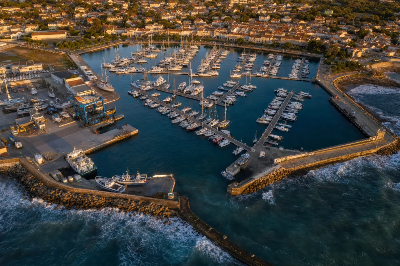 An aerial view of marina pontoons in neat rows